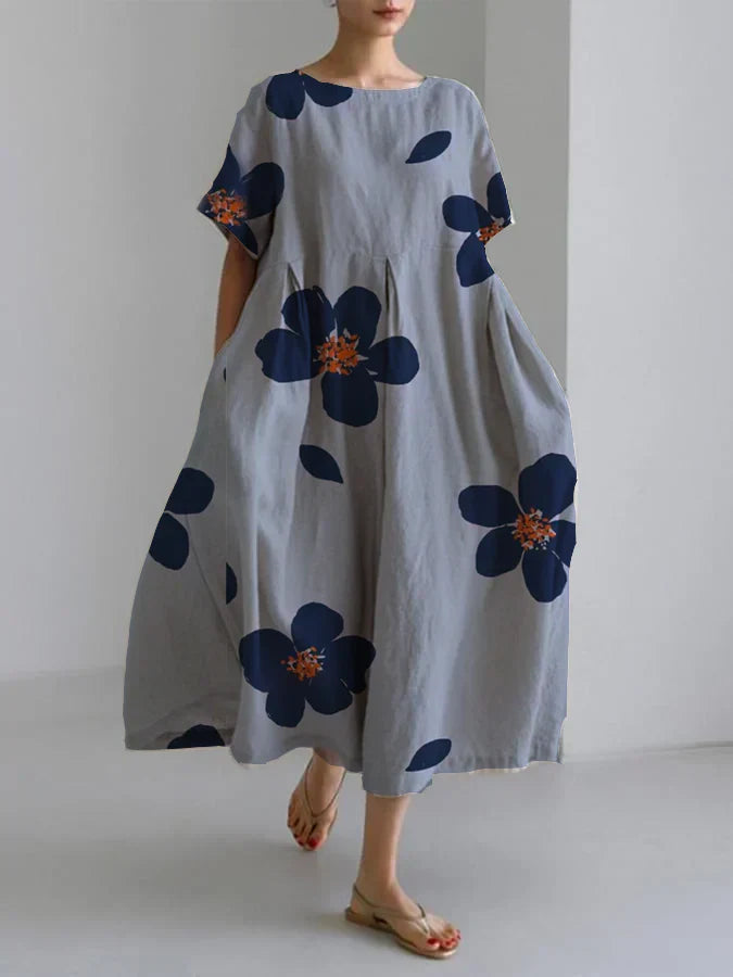 RAFFAELLA | Longue robe florale à la coupe décontractée et aux détails élégants pour les journées chic