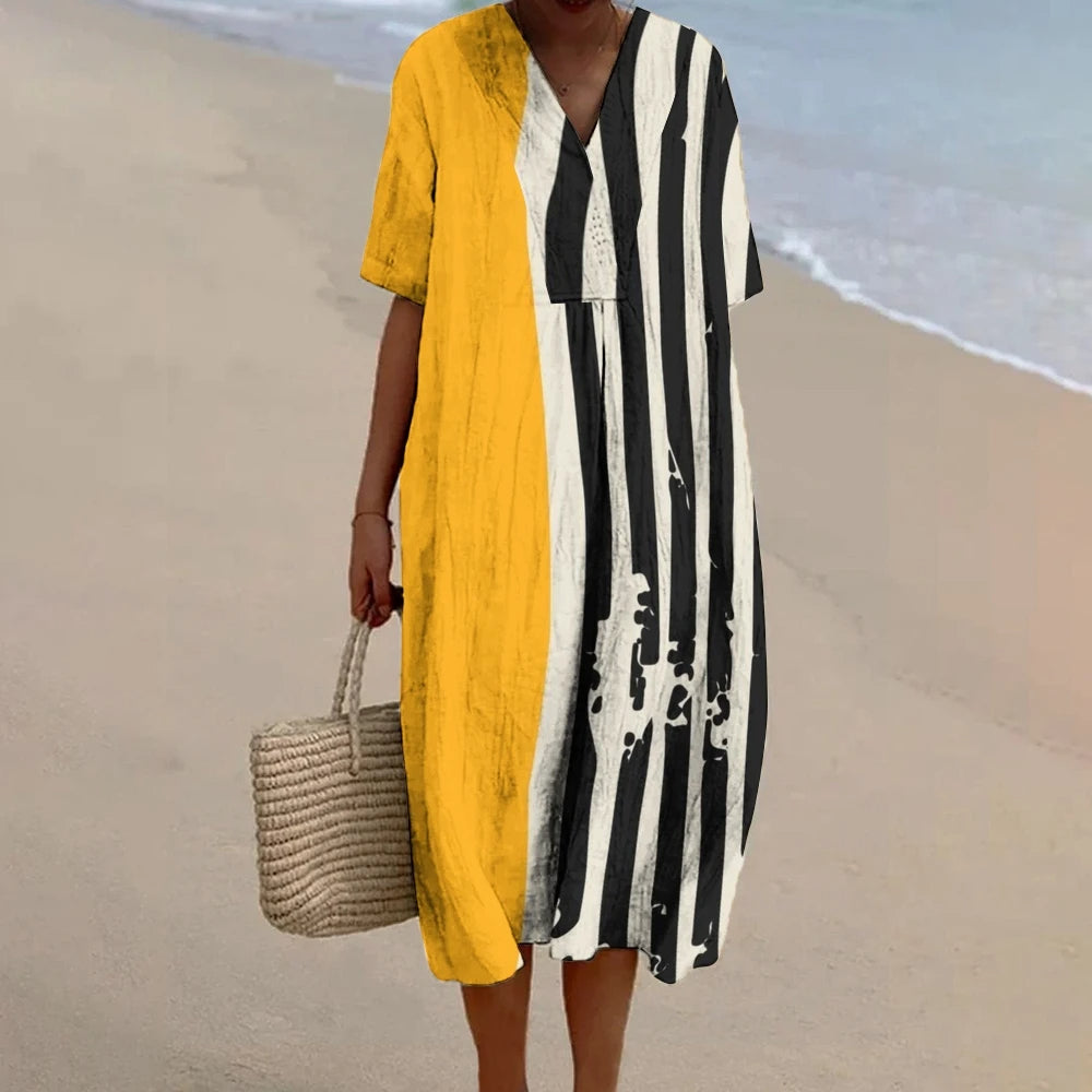 Olivia – Robe Longue Imprimée Asymétrique